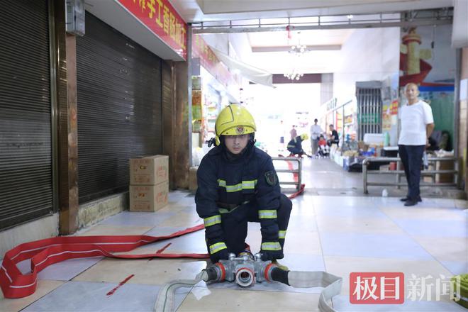 消防演练进市场武汉黄陂警民共筑平安“防火墙”(图3)